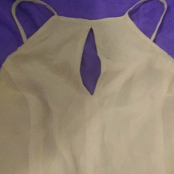 A yellow bebe mini dress, laces up in the back - Picture 4 of 4